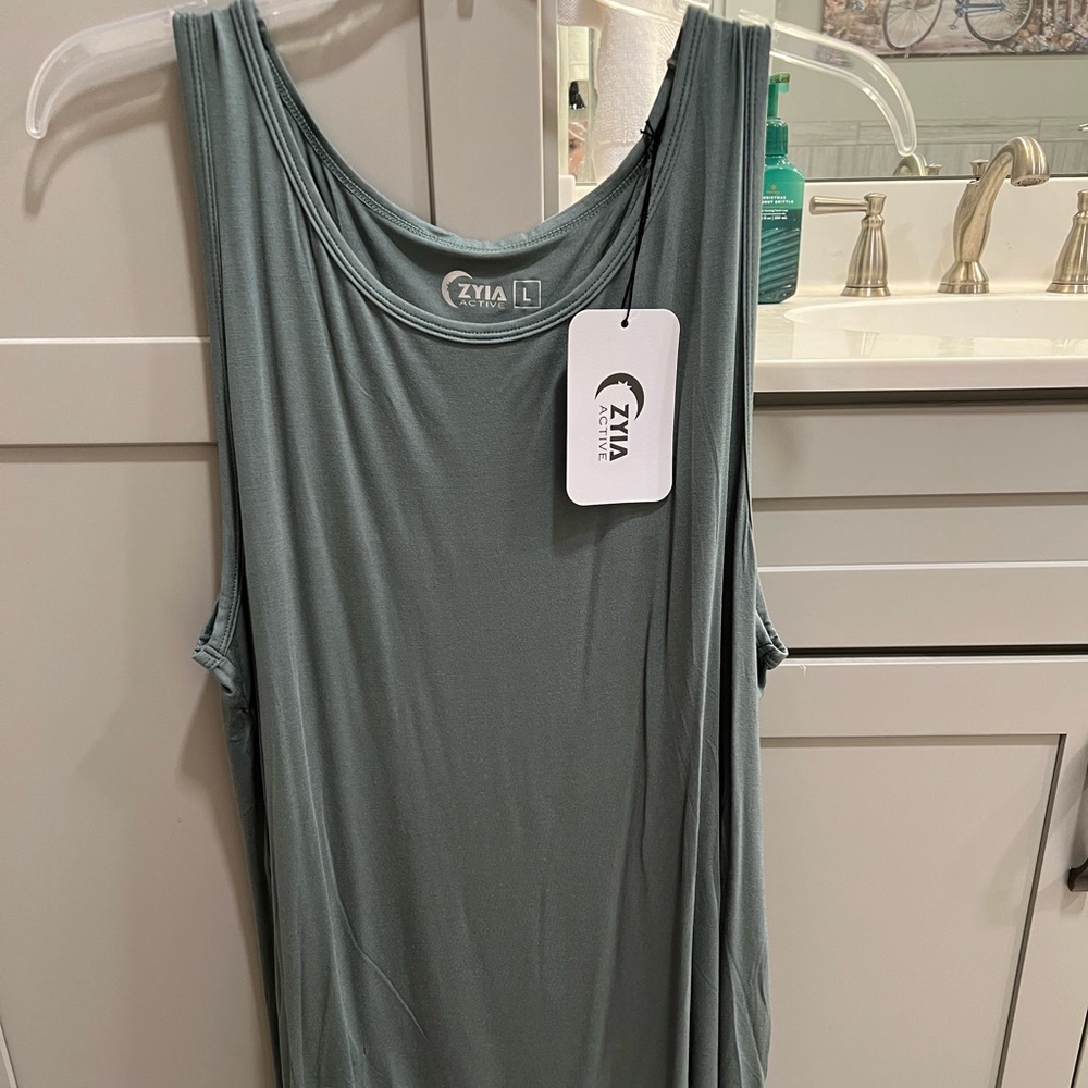 ZYIA Active Finesse slit tunic tank NWT. Size-Large Color-Olive Green